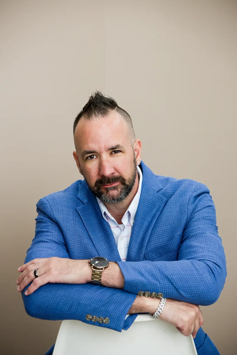 Chris Heidlebaugh — professional headshot in blue blazer